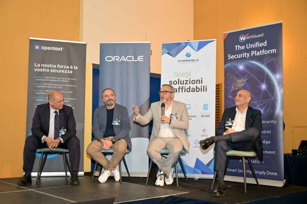 I partner tecnologici di SMI Group presenti all'evento_ da sx Alessandro Frillocchi, Senior Account Manager OpenText - Gianluca Liparoti, AI Sales Lead for Italy Oracle - Andrea Scattina, Count